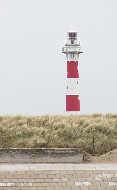 Nieuwport Lighthouse
Author of the photo: [url=https://www.flickr.com/photos/21475135@N05/]Karl Agre[/url]
Keywords: Nieuwpoort;Belgium;North Sea