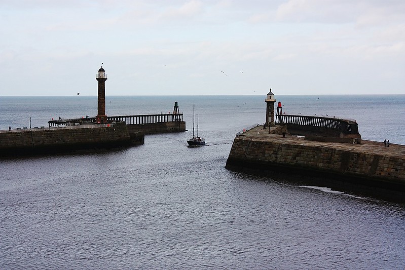 Whitby harbour lighthouses
Left stone tower: Whitby West Pier old lighthouse 
Left sceletal tower with lantern: Whitby West Pier light
Right stone tower: Whitby East Pier old lighthouse 
Right sceletal tower with lantern: Whitby East Pier light
Author of the photo: [url=https://www.flickr.com/photos/34919326@N00/]Fin Wright[/url]

Keywords: Scarborough;England;North sea;United Kingdom