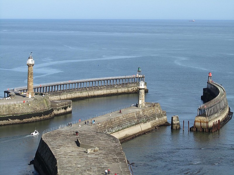 Whitby harbour lighthouses
Left stone tower: Whitby West Pier old lighthouse 
Left sceletal tower with lantern: Whitby West Pier light
Right stone tower: Whitby East Pier old lighthouse 
Right sceletal tower with lantern: Whitby East Pier light
Author of the photo: [url=http://www.flickr.com/photos/69256737@N00/]Richard Barron[/url]
Keywords: England;North sea;United Kingdom;Whitby