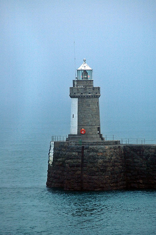 Guernsey / Castle Breakwater (St. Peter Port New Harbour Range Front) lighthouse
Taken just after arrival in Guernsey, on route to Jersey.
Was a very foggy and damp day. 
Additionally to entrance light it functions as St.Peters front range light
Keywords: Guernsey;English channel;United Kingdom