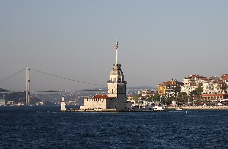 Istanbul / Kizkulesi lighthouse (old and new)
According to [url=http://www.unc.edu/~rowlett/lighthouse/tur2.htm]Russ[/url]:
Date unknown, but very old. Inactive. Approx. 23 m (75 ft) square cylindrical stone tower with a domed cupola, topped by a tall flagstaff. Adjacent to the historic building is an active light. This building has a long and complicated history. The first structure known to have been built here was a fortress built by the Athenian general Alcibiades in 408 BCE. Another fortress was built by the Byzantine emperor Alexius Comnenus in 1110 CE. The first record of a lighthouse dates from 1509, in the early Ottoman period. The present form of the tower results from reconstructions by the Ottoman emperors Mustafa III in 1763 and Mahmud II in 1832. The tower is the subject of several romantic legends, leading to its name as the Maiden's Tower (K?z Kulesi in Turkish). The oldest legend is the classic Greek tale of Leander and Hero, who supposedly met at this spot. In 1995 the Ministry of Tourism leased Maiden's Tower for 49 years to the Hamo??lu Holding Company, which agreed to restore the structures and open them to tourists. The restoration was completed in 2000. Today the building houses a museum and a popular restaurant. 
Keywords: Istanbul;Bosphorus;Turkey