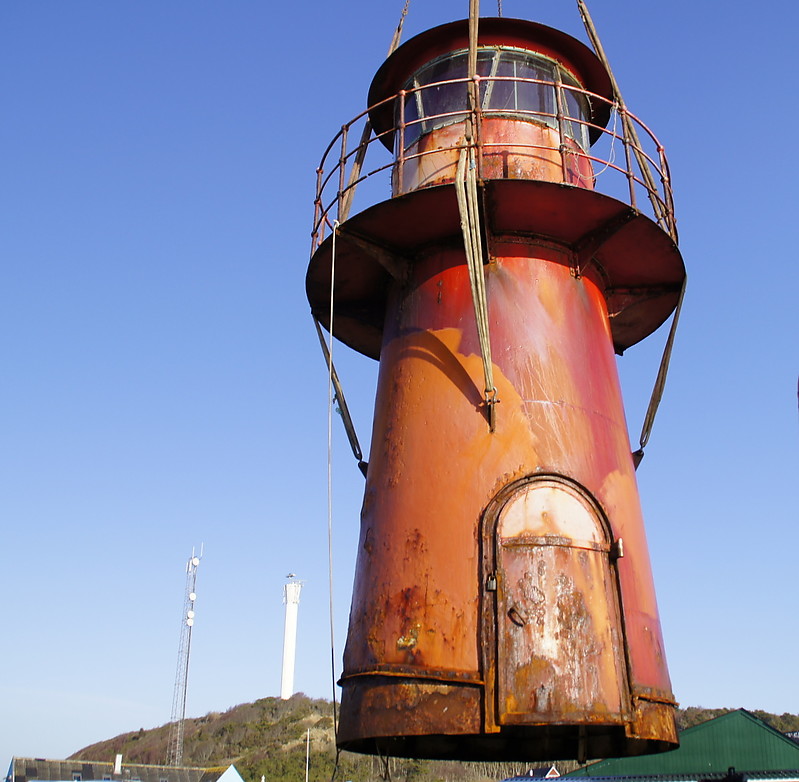 Kattegat / Anholt Havn Lighthouse (harbour pierhead light)
Replaced by a modern light, preserved at a restaurant terrace nearby.
Keywords: Kattegat;Anholt;Denmark