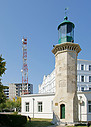 lighthouse_and_modern_radio_tower.jpg