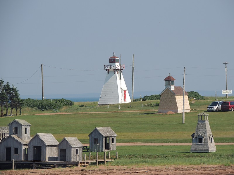 Prince Edward Island / Wood Islands Lighthouse Museum
1. Left - Wood Islands Harbour Range Rear lighthouse (inactive, relocated to museum in 2013)
2. Middle - Wood Islands Harbour Range Front lighthouse (inactive, relocated to museum in 2013)
3. Small grey - unknown 
Author of the photo: [url=https://www.flickr.com/photos/bobindrums/]Robert English[/url]
Keywords: Prince Edward Island;Canada;Northumberland strait