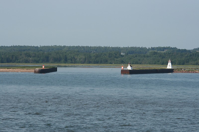 Prince Edward Island / Wood Islands Harbour Range Front (left) and rear (right) lights
Also at left breakwater end: 
CCG#975 Wood Islands Harbour West Breakwater light; height 5 elev 6; Fl 3s. flash 1s, eclipse 2s, green, 5 nm (seasonal)
Right breakwater end: 
CCG#975.1 Wood Islands Harbour East Breakwater light;  height 5 elev 6; Fl 3s. flash 1s, eclipse 2s, red, 5 nm (seasonal)
Author of the photo: [url=http://www.flickr.com/photos/21953562@N07/]C. Hanchey[/url]
Keywords: Prince Edward Island;Canada;Northumberland strait