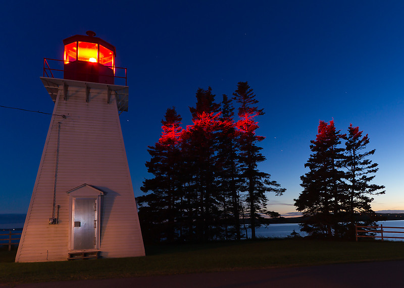 Nova Scotia / Jerome Point Lighthouse at night
Watching over the southern entrance to Great Bras d'Or Lake from the town of St. Peter's, the Jerome Point lighthouse is a well preserved and often visited park beacon.
Author of the photo: [url=https://www.flickr.com/photos/jcrowe/sets/72157625040105310]Jordan Crowe[/url], (Creative Commons photo)
Keywords: Nova Scotia;Canada;Atlantic ocean;Night