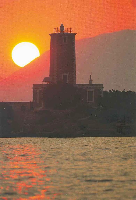 Kafkalida lighthouse at sunset
AKA Cape Killini 
Source of the photo: [url=http://www.faroi.com/]Lighthouses of Greece[/url]

Keywords: Greece;Ionian sea;Sunset