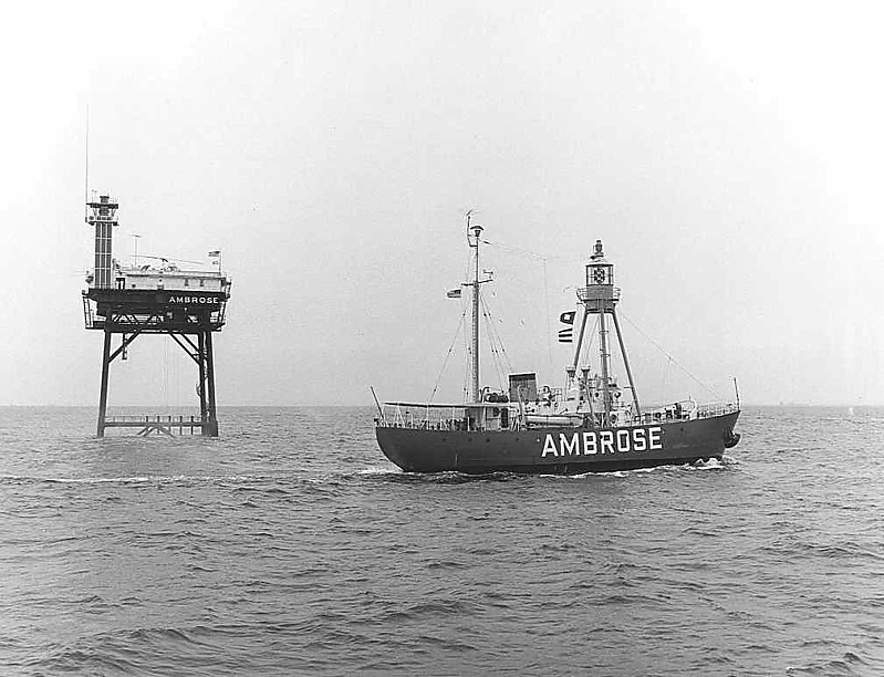 United States Lightvessel WLV-613
Photo from [url=http://www.uscg.mil/history/weblightships/Lightship_Photo_Index.asp]US Coast Guard site[/url]
"Ambrose Lightship (WLV-613) makes farewell departure as new Ambrose Offshore Light Structure is placed in operation."  No photo number; 23 August 1967; photo by PH2 Dorwin Douglass, USCG [3rd District Photo Lab, Governer's Island, NY.].
The original light station was put into operation on August 23, 1967, replacing the obsolete Lightship Ambrose, and cost $2.4 million. The tower design was a Texas Tower, a very strong steel pipe structure based on the oil platforms built for use in the Gulf of Mexico.  The tower station was situated about 7.5 miles (12.1 km) off of the coast of Sandy Hook, New Jersey in approximately 70 feet (21 m) of water and was supported by four 42-inch (1,100 mm) steel pipes, sunk down about 245 feet (75 m) to the bedrock. The light was about 136 feet (41 m) above mean low water and the 10,000,000 candle-power light could be seen for 18 miles (29 km).
In October 1996, on a clear night the 754-foot (230 m) Greek oil tanker Aegeo struck the tower, causing severe damage. It was discovered that the light was not functioning when the tanker hit the tower. The Aegeo's captain was later found to be at fault. Three years later, in September 1999 after repairs were deemed insufficient, the old structure was razed by the U.S. Army Corps of Engineers and replaced with a new tower. The new tower was built about 1.5 miles (2.4 km) east of the old site, and is approximately 76 feet (23 m) above mean low water, and the 60,000 candle-power light is visible for 18 miles (29 km).
In January 2001, the 492-foot (150 m) Maltese freighter Kouros V struck the new tower, shortly after the repairs from the previous incident had been completed. This time, the tower suffered extensive damage, and the light was rendered inoperable.  On July 25, 2008, the Coast Guard announced the deconstruction of Ambrose Light would begin on July 28, 2008.
The removal work was done by Costello Dismantling Co. in September 2008. The tugboats Sea Wolf, Sea Bear and Miss Yvette helped out. The Coast Guard has replaced the light with flashing buoys.
Source: [url=http://en.wikipedia.org/wiki/Ambrose_Light]Wikipedia[/url]
Keywords: United States;Lightship;Historic;New York;Offshore