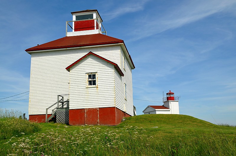 Nova Scotia / Port Bickerton Lighthouses - old (front) and new (distant)
Author of the photo: [url=https://www.flickr.com/photos/archer10/]Dennis Jarvis[/url]
Keywords: Nova Scotia;Canada;Atlantic ocean