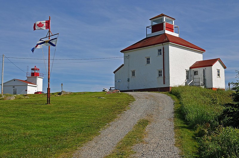 Nova Scotia / Port Bickerton Lighthouses - old (front) and new (distant)
Author of the photo: [url=https://www.flickr.com/photos/archer10/]Dennis Jarvis[/url]
Keywords: Nova Scotia;Canada;Atlantic ocean
