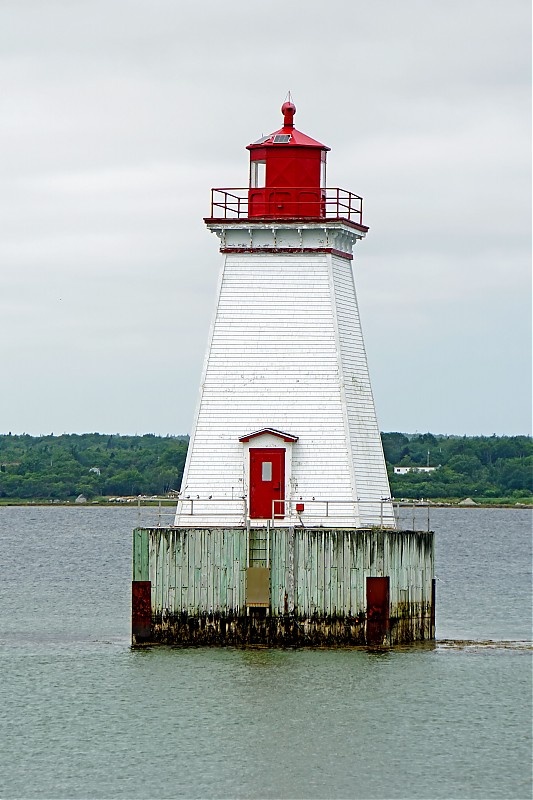 Nova Scotia / Sandy Point Lighthouse
Author of the photo: [url=https://www.flickr.com/photos/archer10/]Dennis Jarvis[/url]
Keywords: Nova Scotia;Canada;Atlantic ocean;Offshore