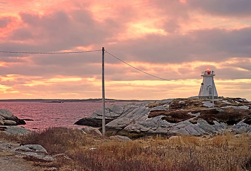 Nova Scotia / Terence Bay Lighthouse - sunset
AKA Tennant Pt
Author of the photo: [url=https://www.flickr.com/photos/archer10/] Dennis Jarvis[/url]

Keywords: Atlantic ocean;Canada;Nova Scotia;Sunset