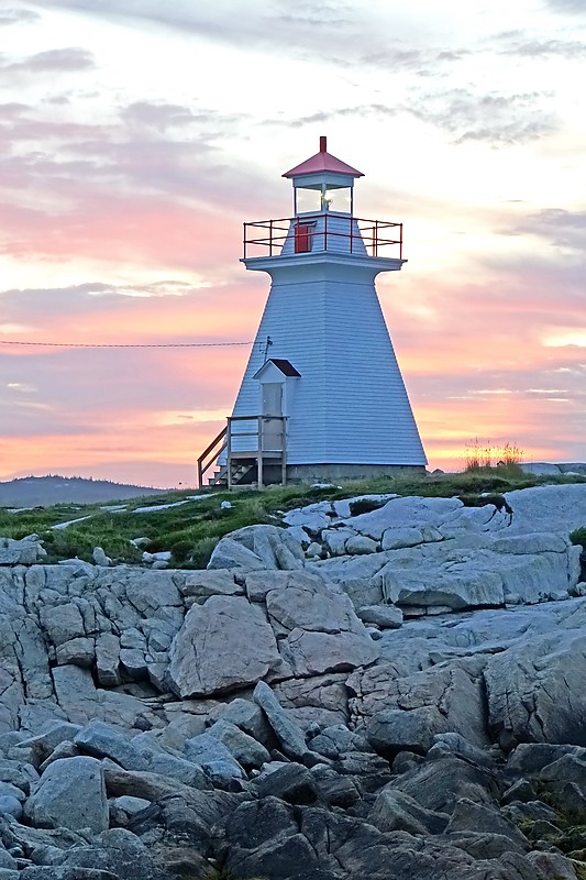 Nova Scotia / Terence Bay Lighthouse - sunset
AKA Tennant Pt
Author of the photo: [url=https://www.flickr.com/photos/archer10/]Dennis Jarvis[/url]
Keywords: Atlantic ocean;Canada;Nova Scotia;Sunset