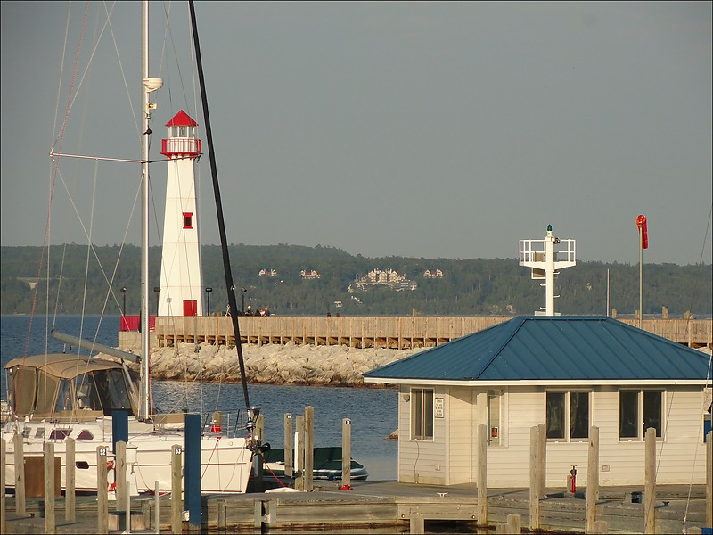 Michigan / St. Ignace / Wawatam lighthouse
 Author of the photo: [url=https://www.flickr.com/photos/jowo/]Joel Dinda[/url]            
In front Wawatam No1 green light is seen (#12609, elev 8, Flashing, 2.5s green, range 3 nm)     
Keywords: Michigan;Lake Huron;United States