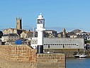 Penzance_Harbor_Pier_Lighthouse2C_Cornwall2C_England.jpg