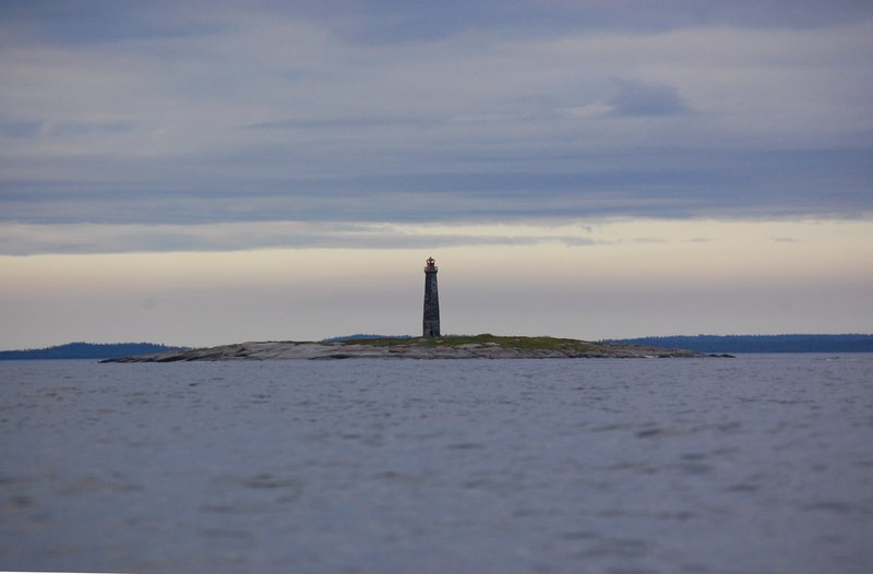 White sea / Topy lighthouse
Photo by [url=http://sea-kayak.ru/authors/?idnews=275&mode=reports]Andrej Vasiljev[/url]
Keywords: White sea;Russia;Solovetsky Islands