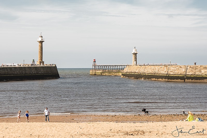Whitby harbour lighthouses
Left stone tower: Whitby West Pier old lighthouse 
Left sceletal tower with lantern: Whitby West Pier light
Right stone tower: Whitby East Pier old lighthouse 
Right sceletal tower with lantern: Whitby East Pier light
Keywords: England;North sea;United Kingdom;Whitby